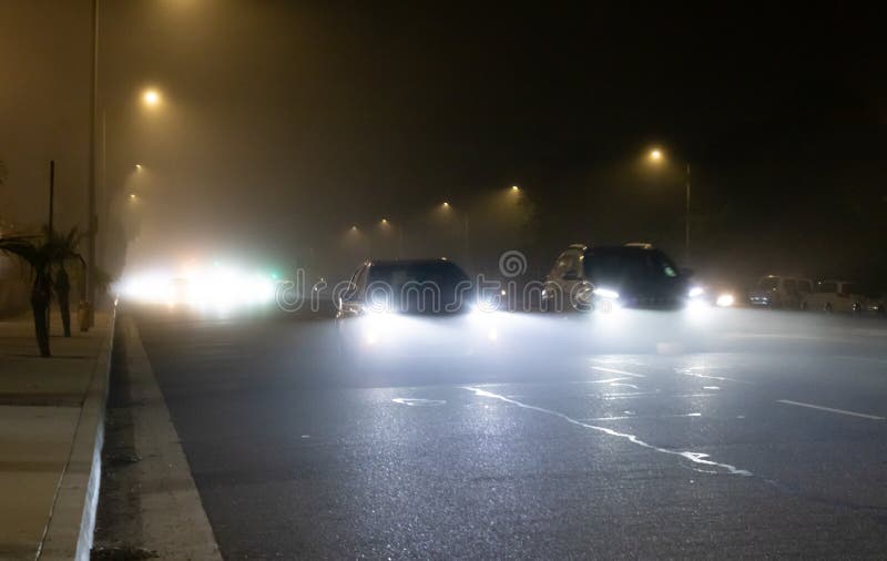 Driving in the foggy night stock image. Image of traffic 208282271