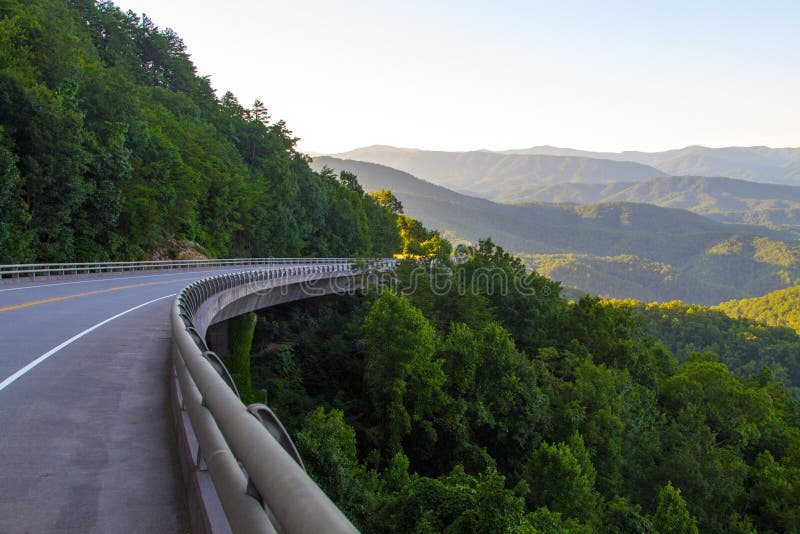 Winding mountain road along the Great Smoky Mountains Foothills Parkway in Wears Valley, Tennessee, USA. Winding mountain road along the Great Smoky Mountains Foothills Parkway in Wears Valley, Tennessee, USA.