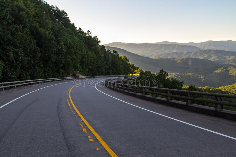 Winding mountain road along the Great Smoky Mountains Foothills Parkway in Wears Valley, Tennessee, USA. Winding mountain road along the Great Smoky Mountains Foothills Parkway in Wears Valley, Tennessee, USA.