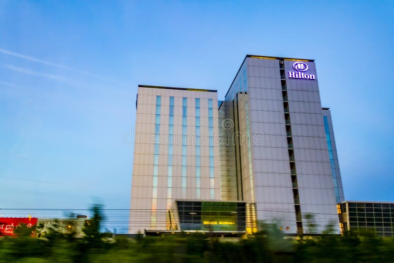 Driving by the Hilton Hotel in Sunrise in Denmark Editorial Image