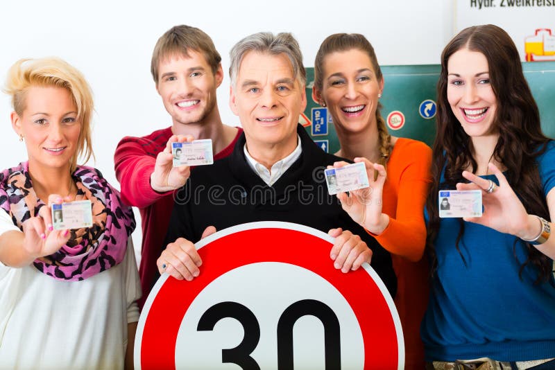 Driving instructor with his class royalty free stock photography Driving instructor with his class royalty free stock photography