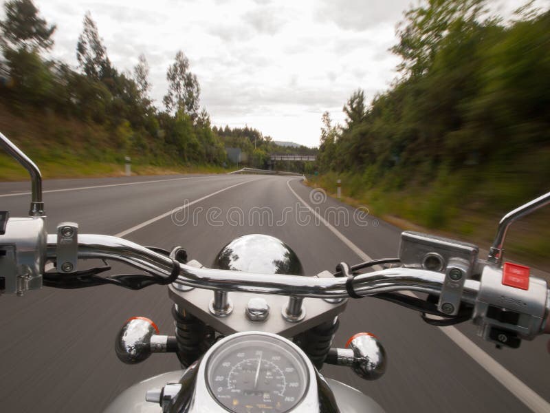 Driving a motorcycle royalty free stock images Driving a motorcycle royalty free stock images