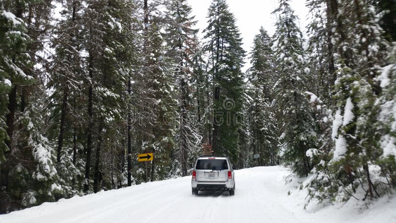 Driving mountains off-road snowstorm winter