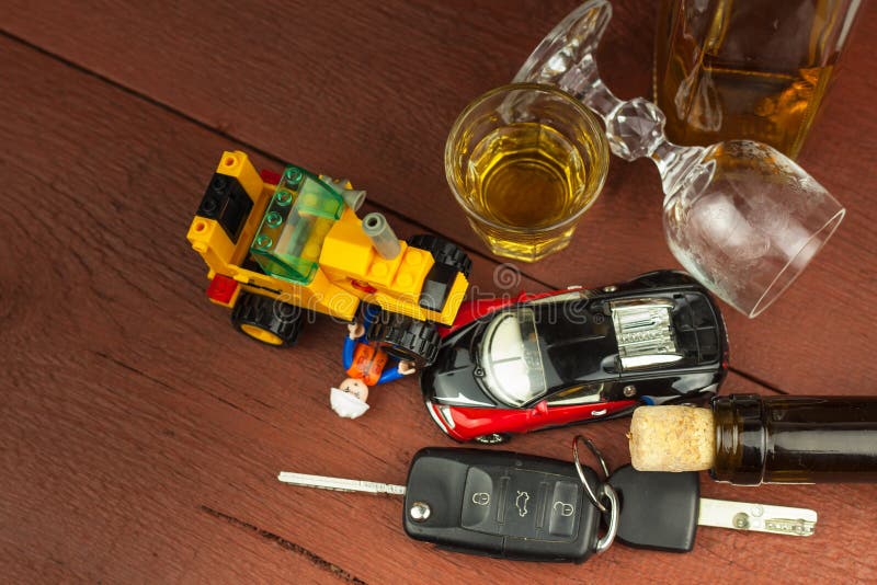 Driving Under the Influence of Alcohol. Dangerous Ride. Alcohol Behind