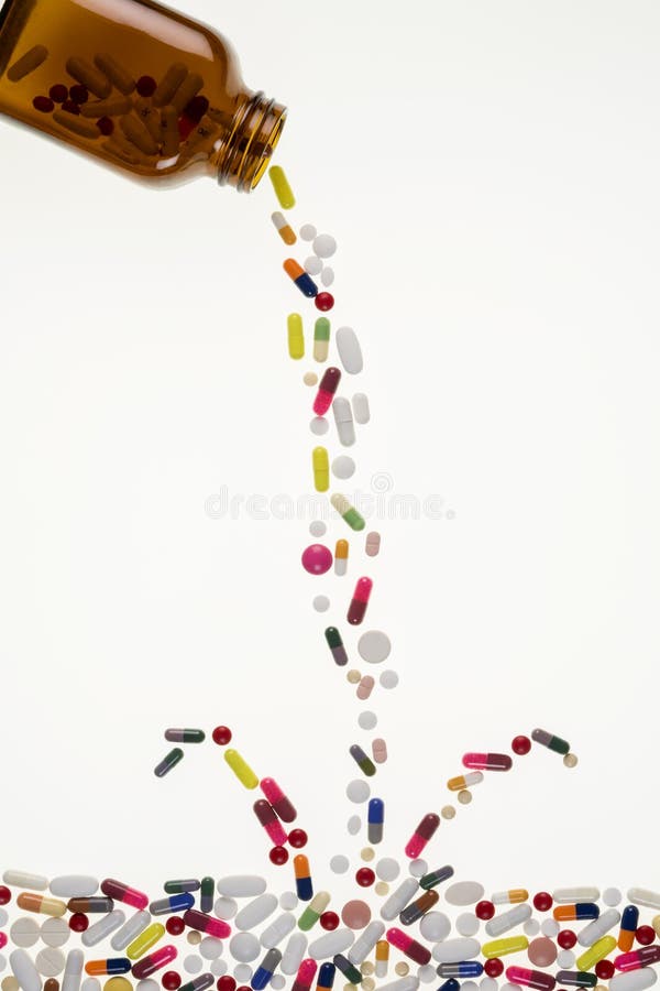 Drugs pouring from a medicine bottle and splashing into a sea of tablets, pills and capsules. Drugs pouring from a medicine bottle and splashing into a sea of tablets, pills and capsules.