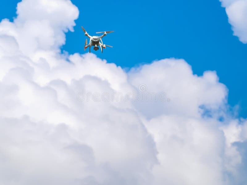 Drone in the blue sky stock photo