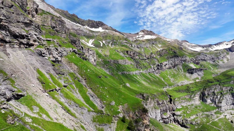 Drone Flight Above A Wonderful Hiking Trail Above The Oeschinensee Lake In The Swiss Alps Drone Flight Above A Wonderful Hiking Trail Above The Oeschinensee Lake In The Swiss Alps