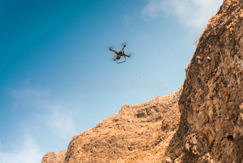 Aerial Photography And Videography. Drone Flying Over Mountain F Stock