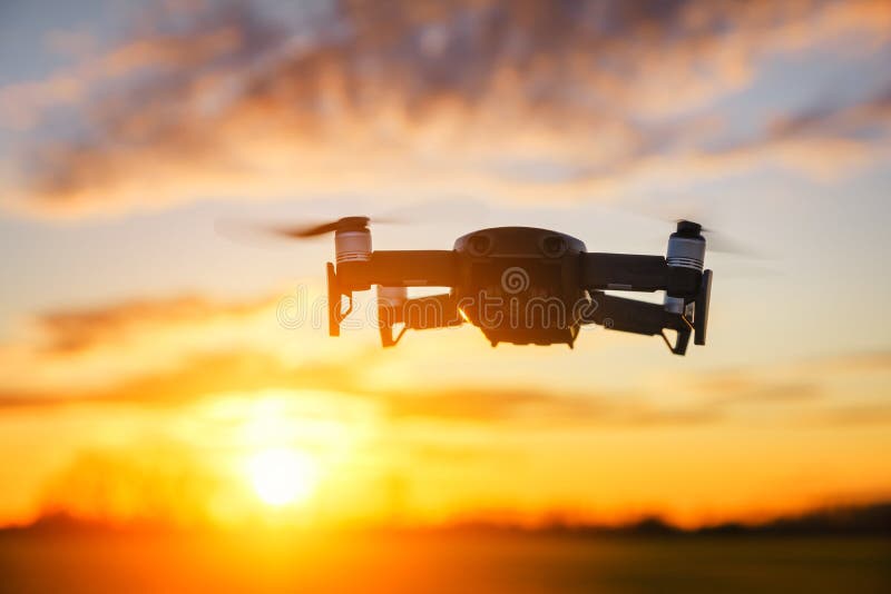 Drone flying on sunset stock image