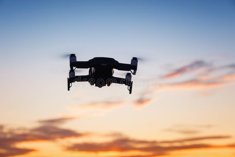 Drone flying on sunset stock image
