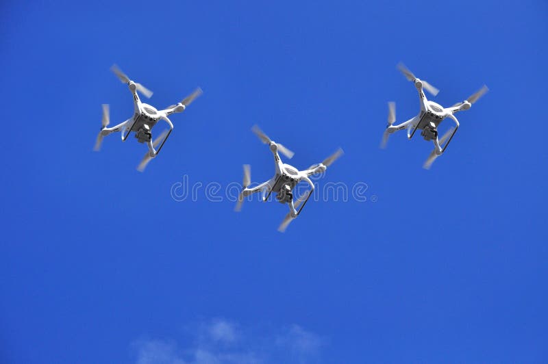 Reach out defeat Hostile Drone Formation Flying Airshow Stock Photo - Image of small, airplane:  173162296