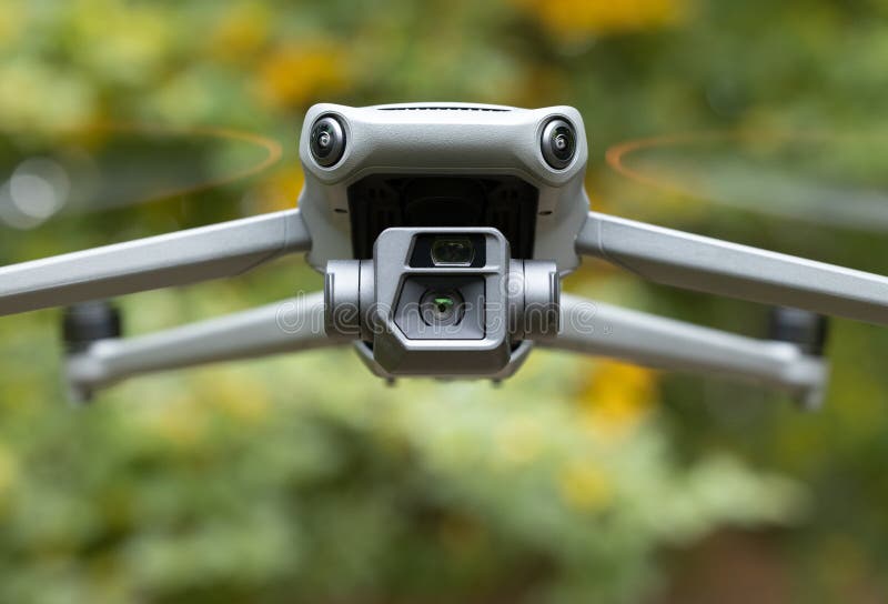 Drone gimbal camera lens front side flying photography and videography device symmetry picture with blurred background space royalty free stock photo
