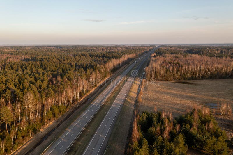 Drone Photography of Highway Surrounded by Agriculture Fields and