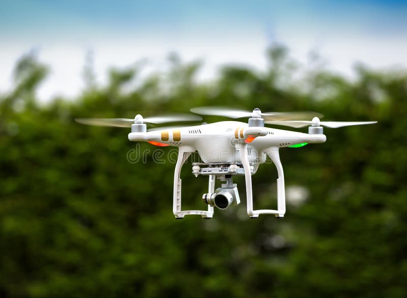 Flying Drone With Camera Stock Photo, Picture and Royalty Free Image. Image  58402856.