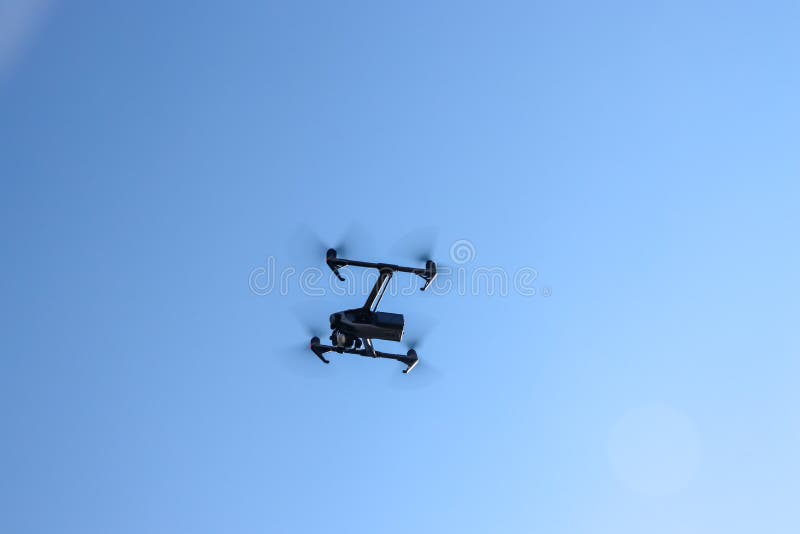Drone with video camera stock photo. Image of blue, aircraft 135256462