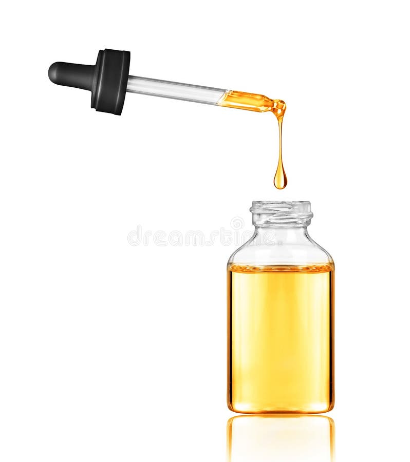 Drop falls from a pipette into a cosmetic bottle royalty free stock photos Drop falls from a pipette into a cosmetic bottle royalty free stock photos
