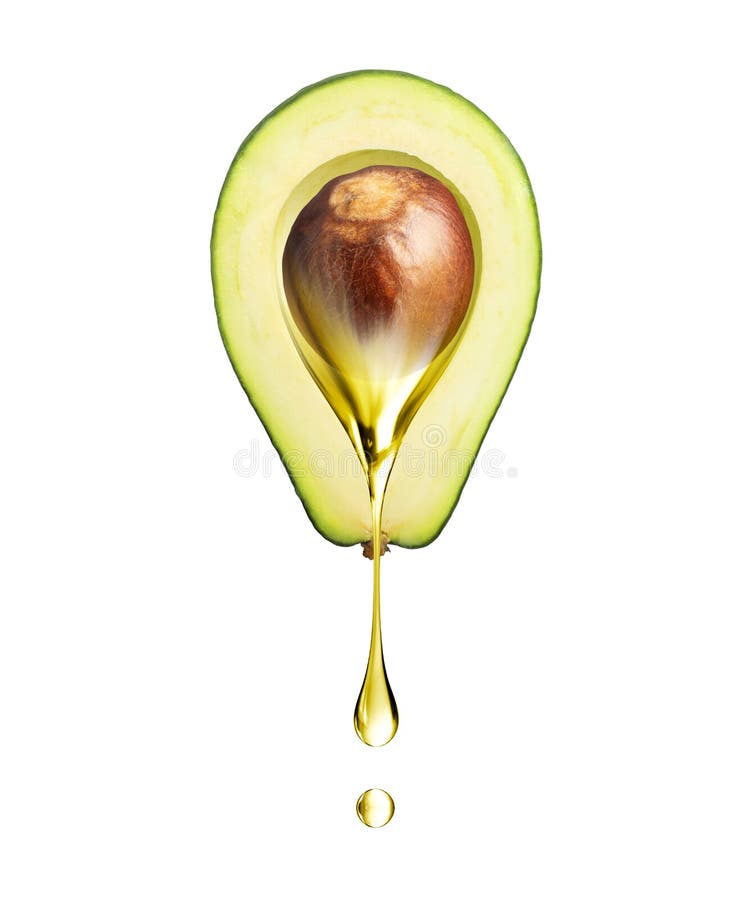 Drop of oily liquid flowing from a half of avocado on a white background stock image
