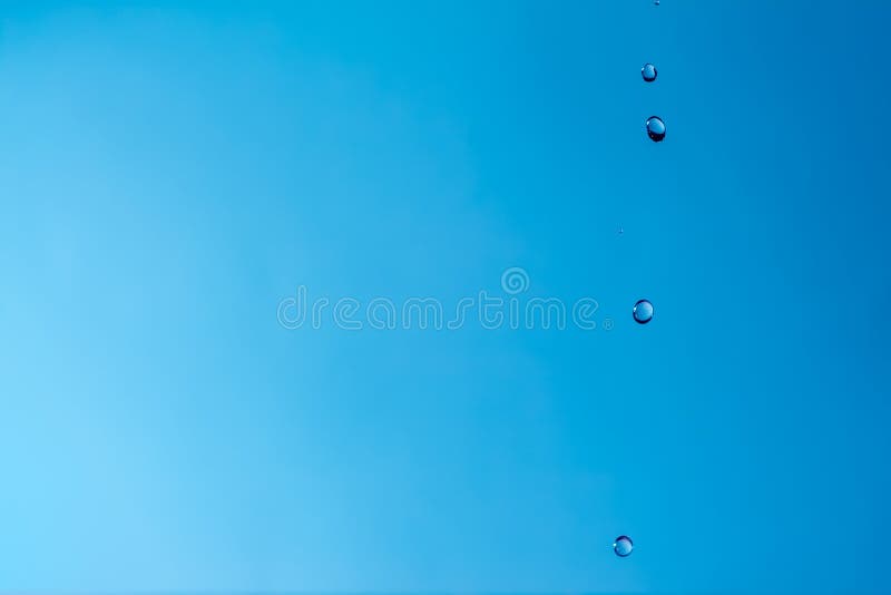 Drop of Water. Blue Water Drop. Falling Water. Water Splash Closeup
