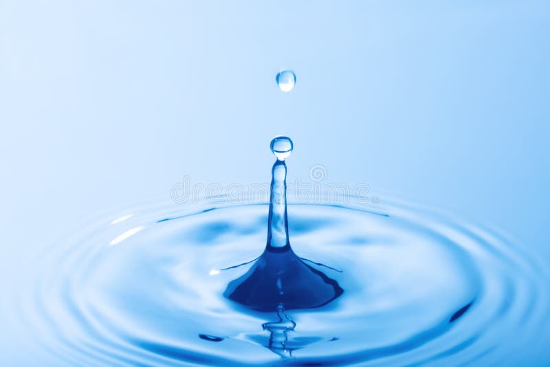 Drop of Water. Water Droplet Falling Impact with Water Surface Stock