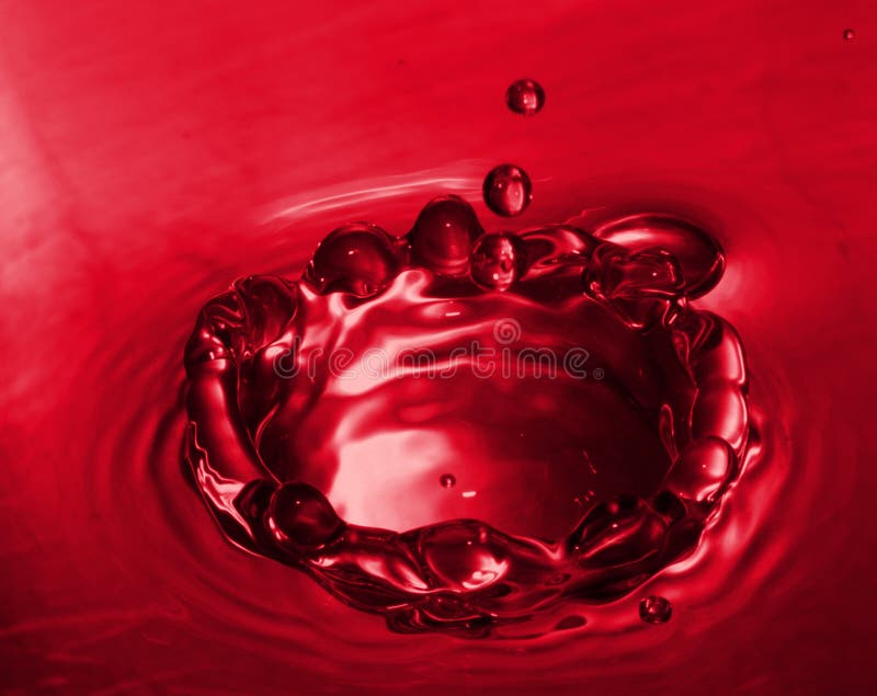 A red splashing droplet...