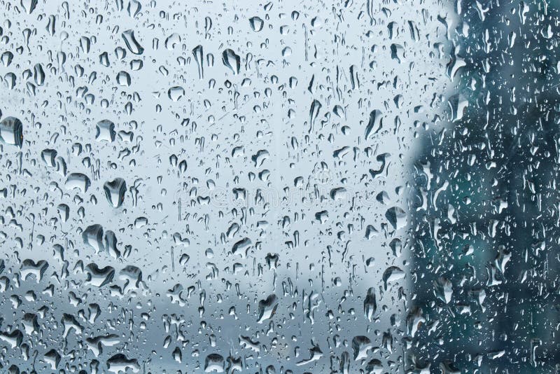 Drops of Rain on Window during the Storm with Blur Background Stock Photo -  Image of background, purity: 183096554