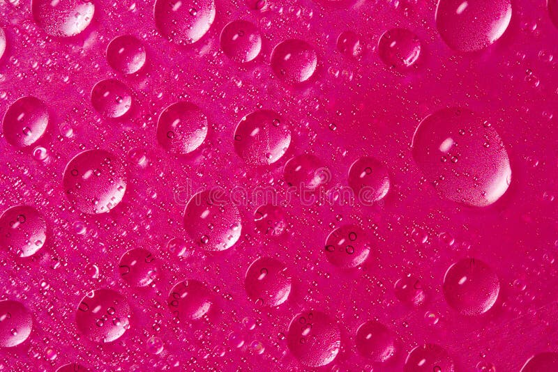 Drops of water on pink