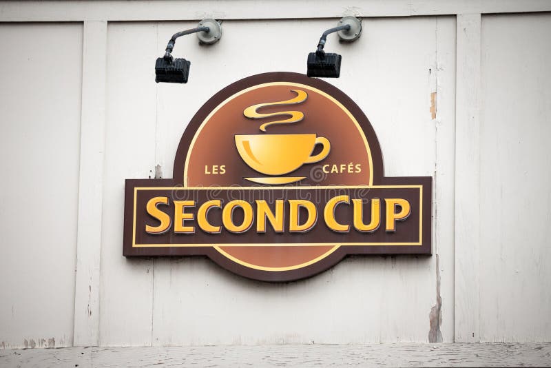 Drugi filiżanki Kawowy logo przed ich lokalną kawiarnią w w centrum Montreal, Quebec Drugi filiżanka jest Kanadyjskim kawiarnią & obraz royalty free Drugi filiżanki Kawowy logo przed ich lokalną kawiarnią w w centrum Montreal, Quebec Drugi filiżanka jest Kanadyjskim kawiarnią & obraz royalty free