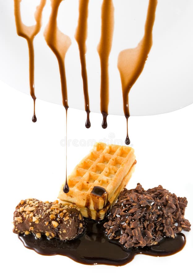 Druipende vloeibare chocolade stock foto Druipende vloeibare chocolade stock foto