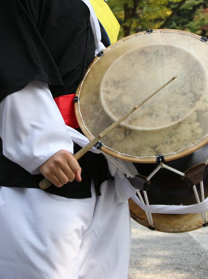 Drummer playing the drum at a traditional Korean wedding