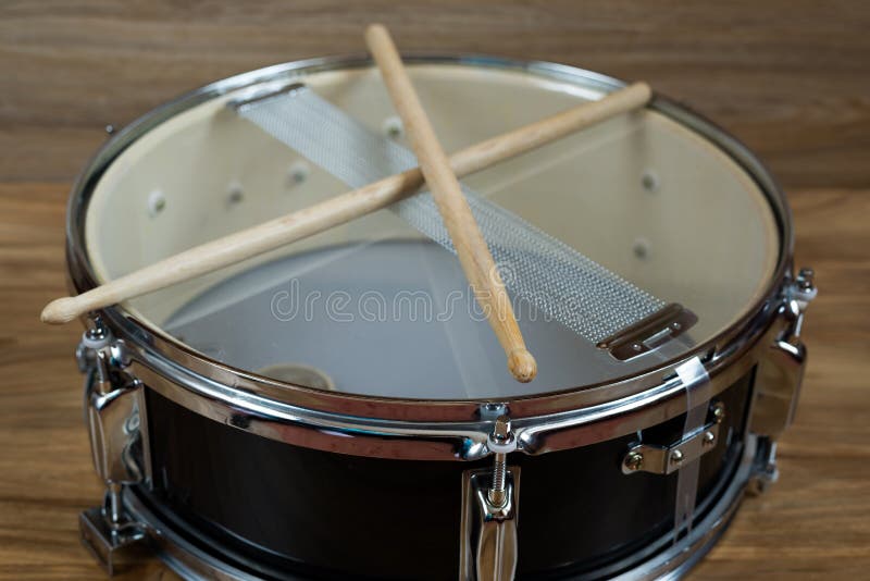 Drum and drumsticks stock image. Image of instrument 37487395