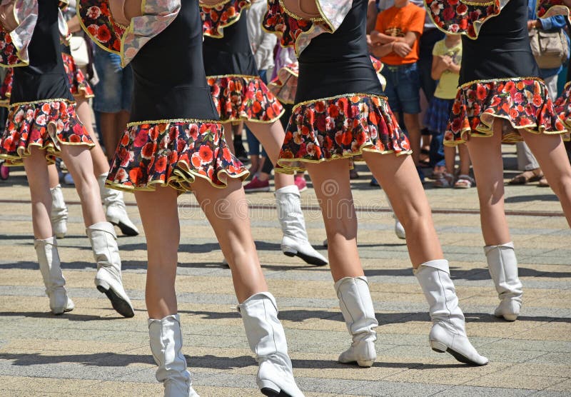 Drum majorettes dancing outdoor. 