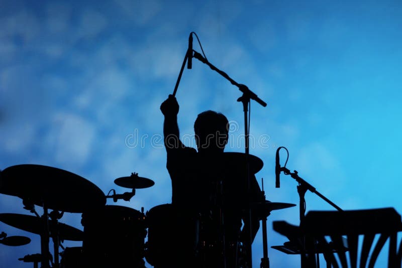 Drummer silhouette on the stage rock concert festival. Drummer silhouette on the stage rock concert festival