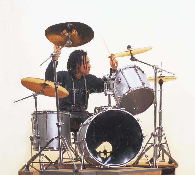 Drummer focusing on playing drums