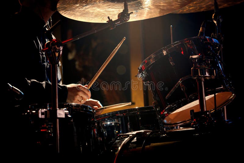 Drummer Playing with Drumsticks on a Rock Drum Set. Stock Illustration
