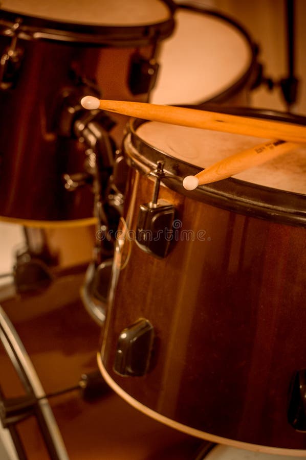 Drums Conceptual Image. Picture of Drums and Drumsticks Lying on Snare