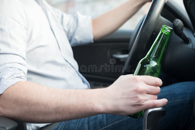 Drunk man driving car and falling asleep stock image Drunk man driving car and falling asleep stock image