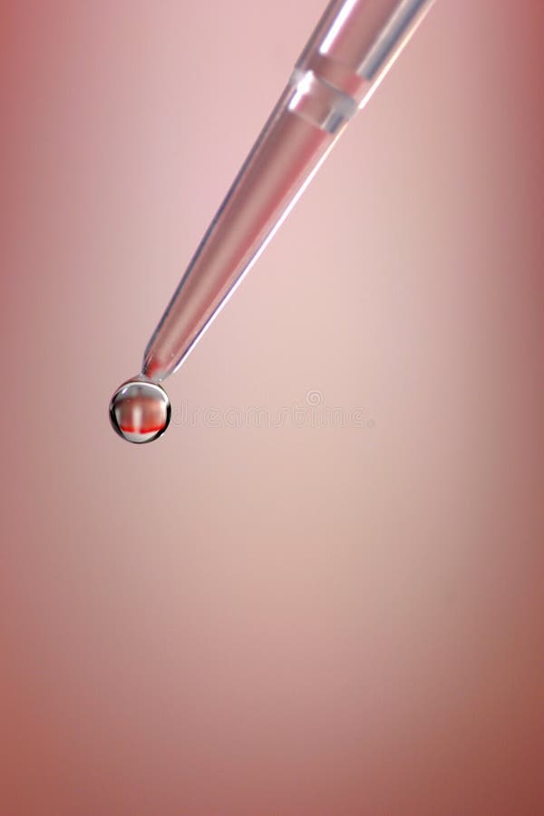 Close up of a drop of liquid in a lab. Close up of a drop of liquid in a lab