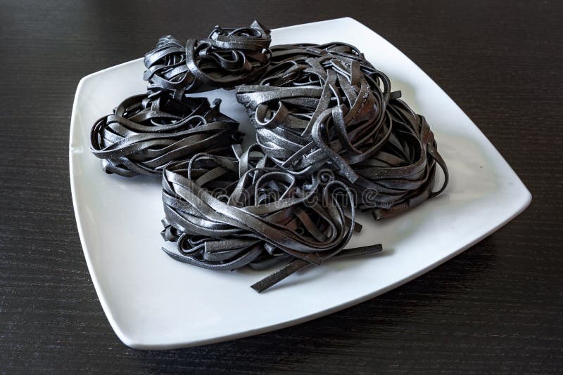 Dry Black Pasta with Cuttlefish Ink. Pasta of Durum Wheat Semolina with ...