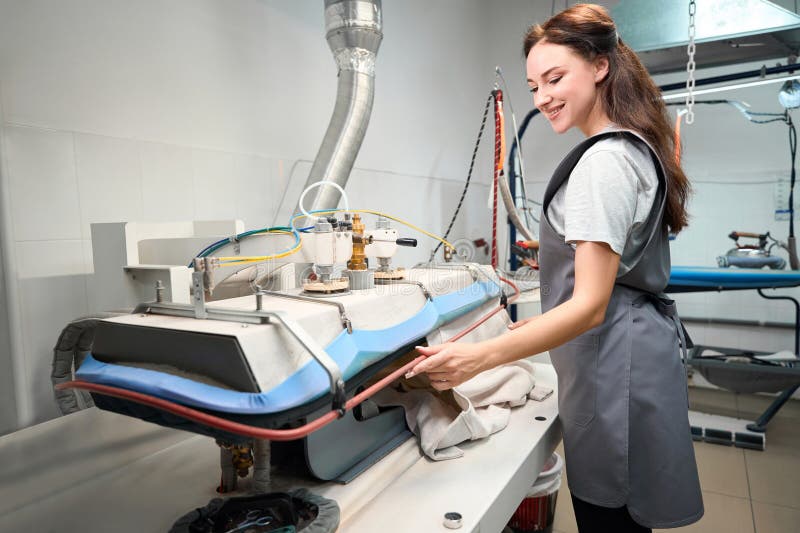 Steam ironing press machine hi-res stock photography and images - Alamy