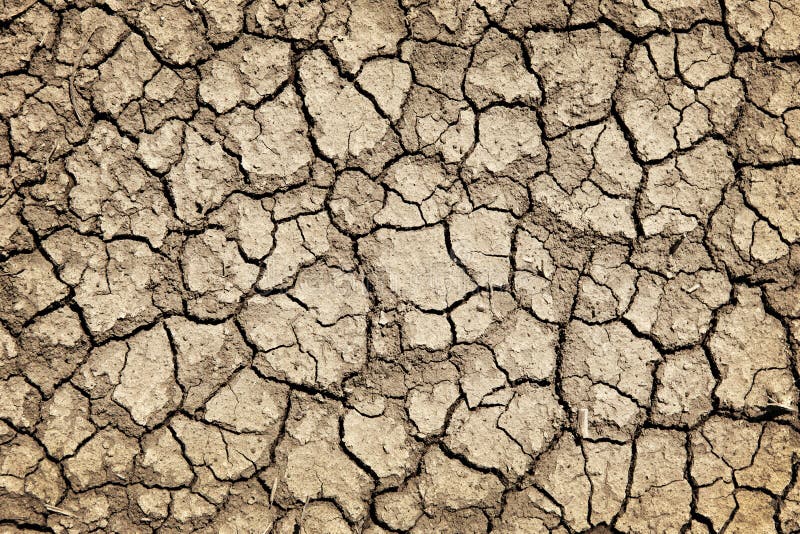 Dry cracked ground during drought stock photo
