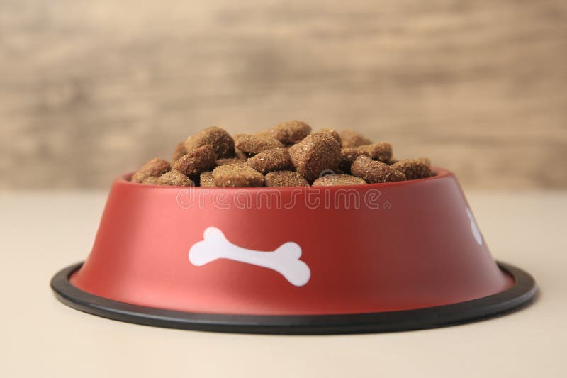 dry-dog-food-in-feeding-bowl-on-beige-table-stock-photo-image-of-dish