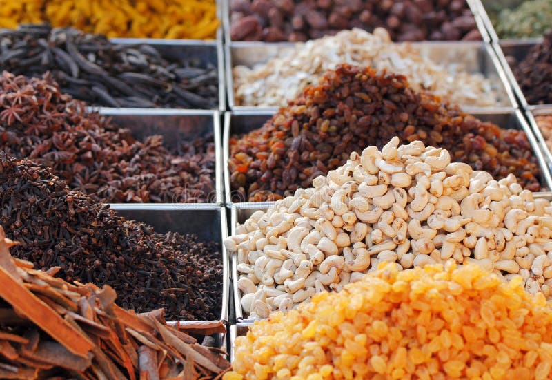 Dry fruits & spices displayed for sale in a bazaar