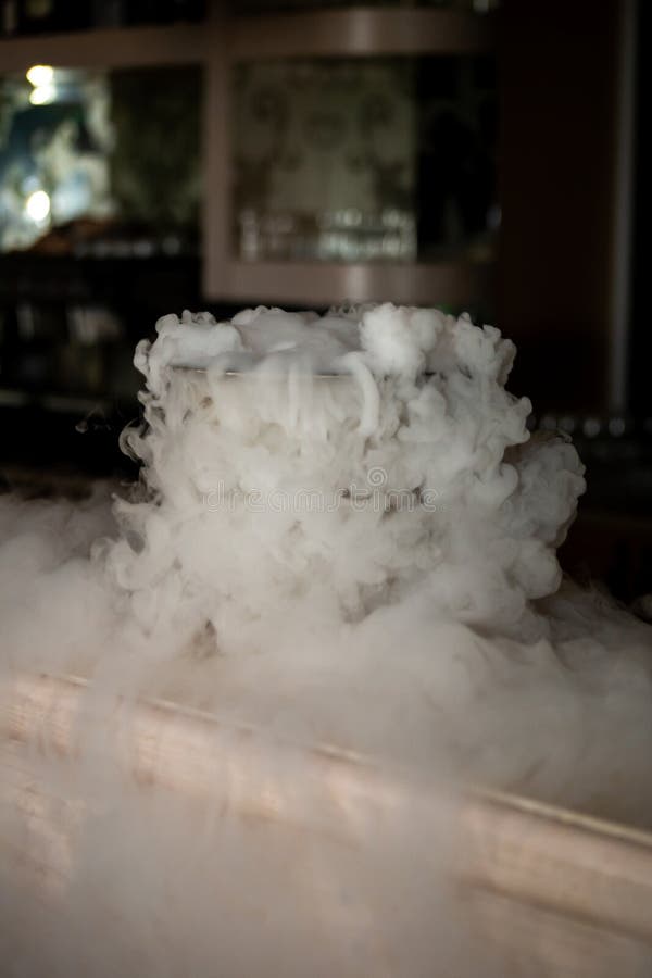 Dry Ice Evaporates and Gives a Thick Fog Stock Photo Image of geyser