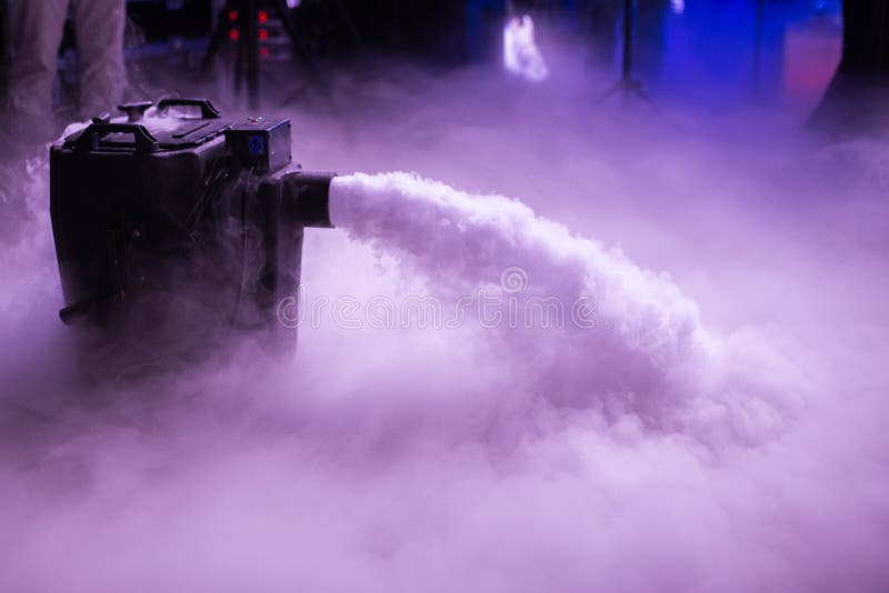 Dry ice low fog machine with hands on for wedding first dance in restaurants stock image Dry ice low fog machine with hands on for wedding first dance in restaurants stock image