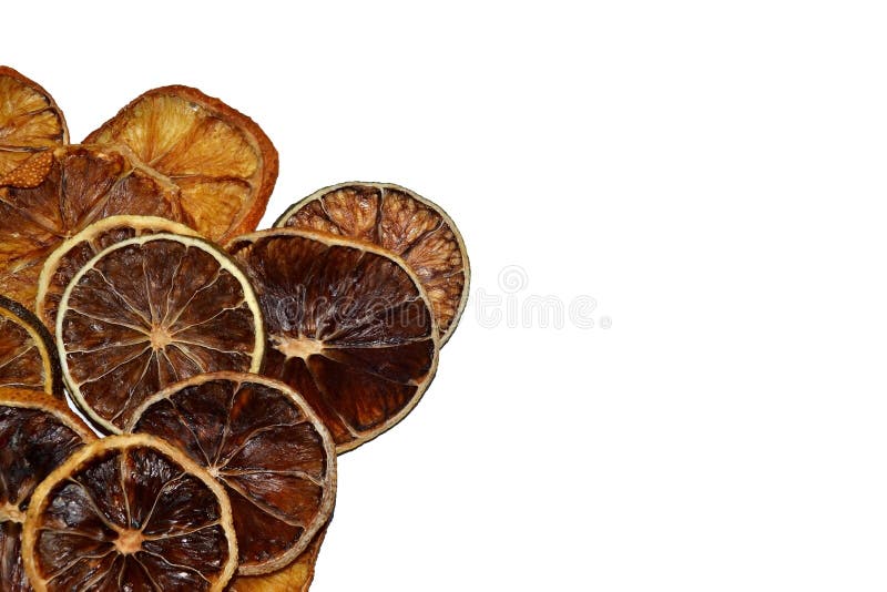 Dry lemon wedges on white background stock images