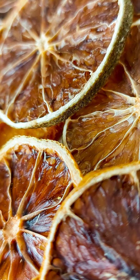 Dry lemon wedges on white background stock photography