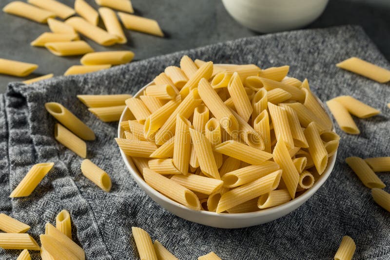 Dry Organic Penne Pasta stock photo. Image of diet, meal 272195124