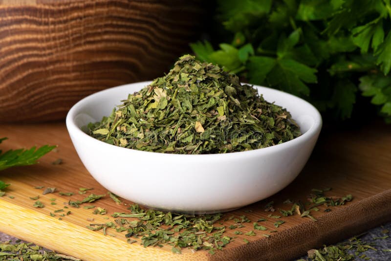 Dry Parsley Leaves in a Bowl. Dry Parsley Spice. Stock Image Image of