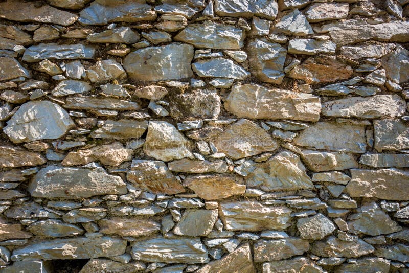 Dry rock wall background stock photo. Image of antique 211676706