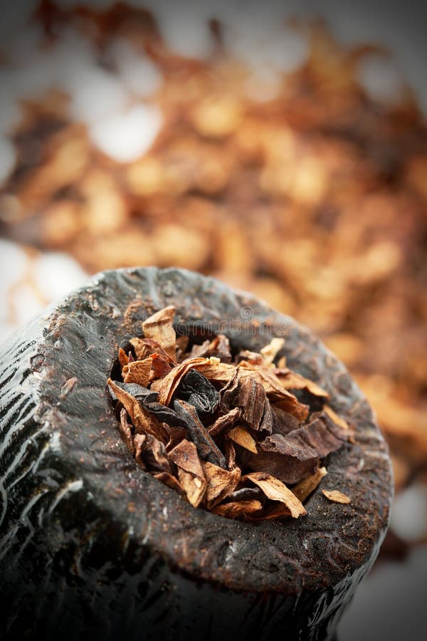 Dry tobacco and pipe stock photo. Image of carving, heap 23615910